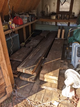 raw pine lumber drying in shed